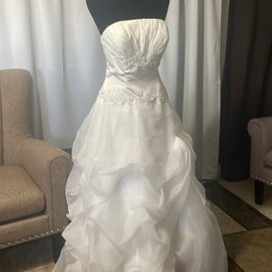 - Ivory ruffled Gown